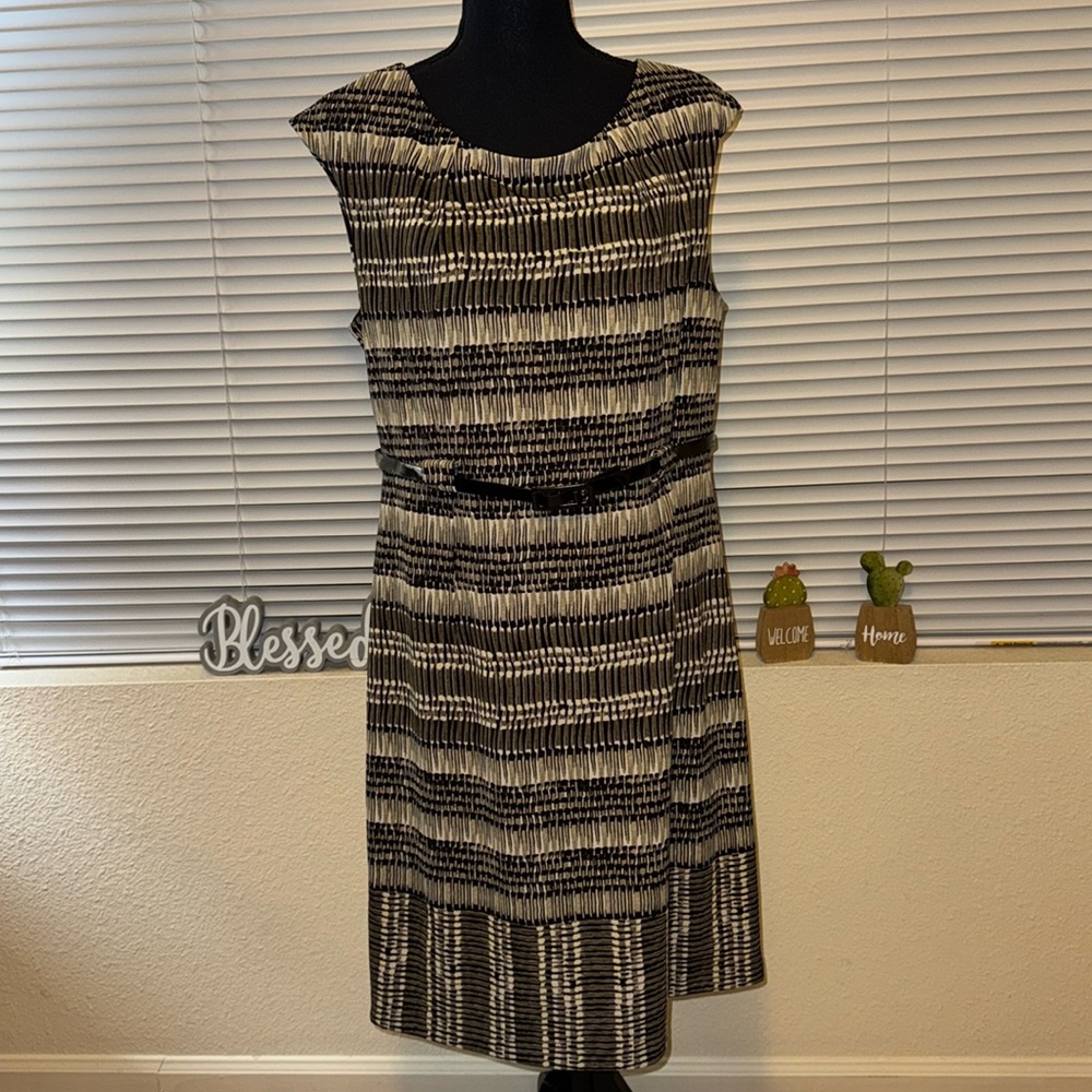 Brand I LE New York, sleeveless black, green, white and tan print dress. Size12